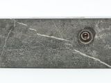 marble block with a hole in the middle of it on a white surface