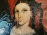 tableau représentant une femme en robe bleue avec une fleur dans les cheveux