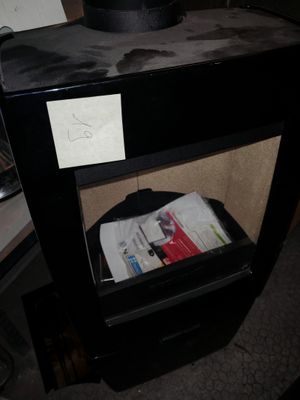 a black table with a hat on top of it