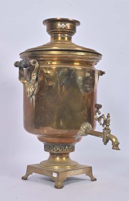 brass plated coffee urn on stand with faucet and spout