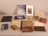 a table with many books and books on it