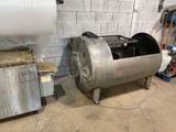 an image of a large metal tank in a garage