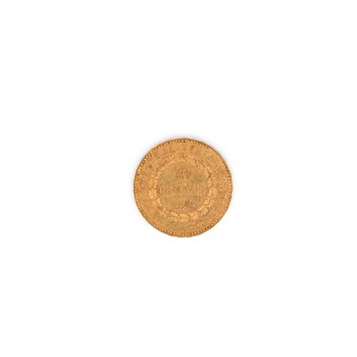 une pièce d'or sur fond blanc