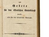 an old book with black writing on a white background