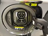 a close up of a car ' s plugged in to a vehicle
