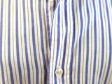 striped shirt with a black tie and a white button up