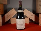 a bottle of wine that is sitting on a table