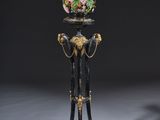 an image of a vase on a stand with flowers on it