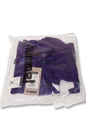 a bag of purple gloves sitting on top of a white table