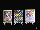 three different types of pokemon cards on a black background