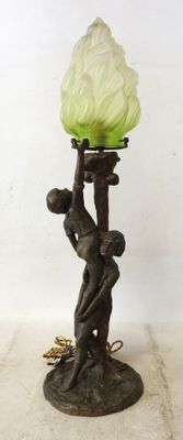 a lamp that is sitting on a table next to a wall