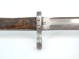 a knife that is laying on a table