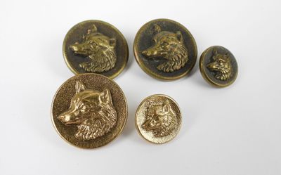 un gros plan sur un ensemble de boutons représentant un chien