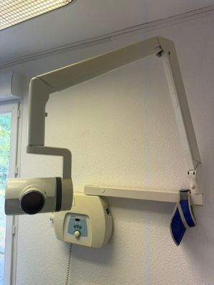 an image of a hospital room with a camera mounted to the wall