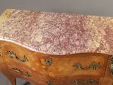 an image of a marble top chest of drawers on a stand
