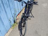 a bicycle parked on the side of the road