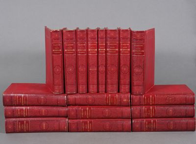 a stack of red books sitting on top of each other