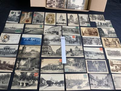 a lot of old postcards that are on the table