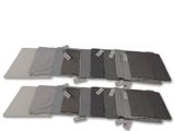 six pieces of cloth that are folded up on a white surface