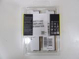 a package of batteries in a plastic container on a table