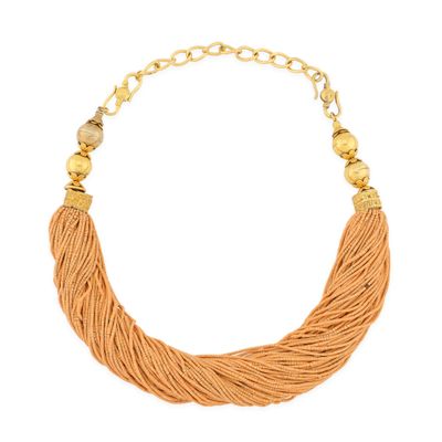 an orange necklace with gold beads on a white background