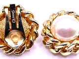 two pairs of gold tone earrings with a pearl in the center