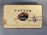 a small tin box with a picture of a plane on it