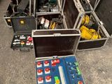 many open cases that are sitting on the floor