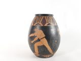 a vase with a picture of a baseball player on it