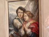 une photo d'un tableau représentant deux enfants accroché au mur