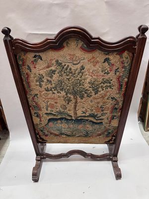 an image of a wooden frame with a tapestry on it