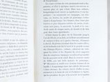 an open book with a picture of a cat on it