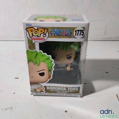 a close up of a pop vinyl figure in a box