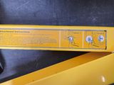 the back of a yellow box with a picture of a person on it