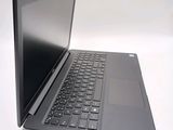 a laptop that is sitting on a white table