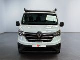 the front view of a white van parked in a white room