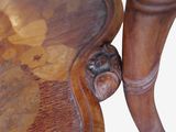 a close up of a wooden table with flowers on it