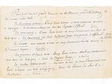 an old document with writing on it sitting on top of a table