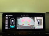 a picture of a car ' s rear view camera in the dash