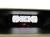 a digital clock on the dashboard of a car