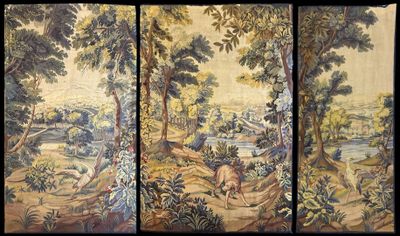 three panels of a tapestry depicting a landscape with trees and animals