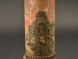an image of a small vase on a wooden stand