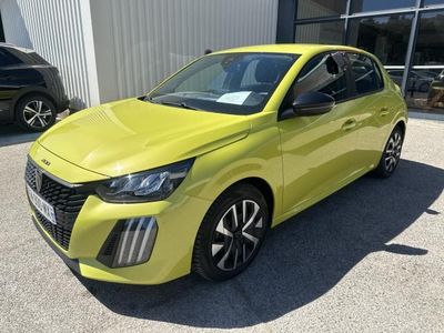 a yellow car parked in front of a building