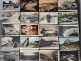 many pictures of a bunch of old photos on the wall