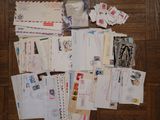 a lot of mail sitting on the floor on the floor