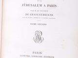 an open book with a black and white title on it