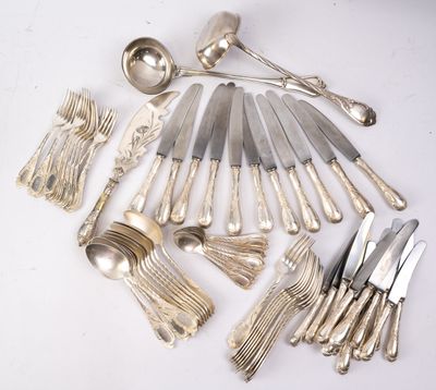 a lot of silver spoons and forks on the table