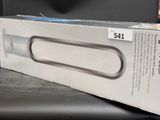 l'emballage d'une nouvelle manette Nintendo Wii posée sur une table
