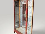 a red display case with glass doors on it