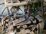 a pile of wood and wires on the ground